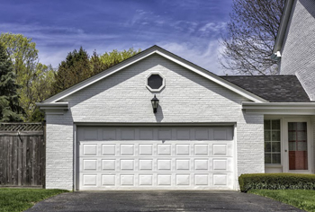 Are You Less Of A Man If You Do Not Fix Your Garage Door On Your Own